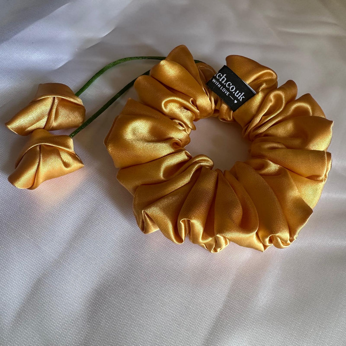 Gold Scrunchie with Hanging Rose Bud Detail